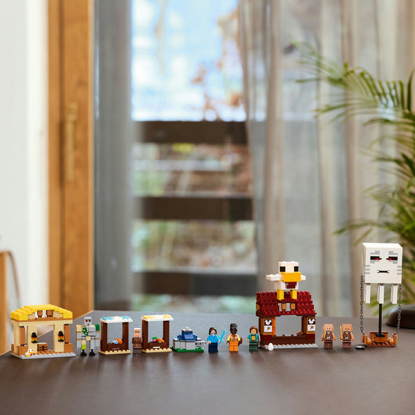 LEGO Minecraft 21273 — Atacul baloanelor Ghast asupra satului – imagine 6
